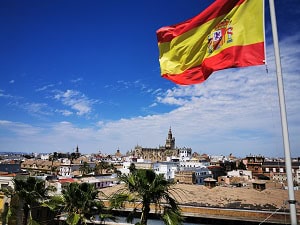 Flag of Spain, representing the Spanish language and culture
