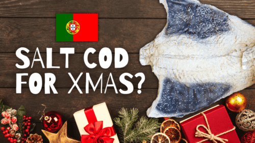 Dried salted cod with Christmas presents and Portuguese flag – traditional bacalhau eaten on Christmas Eve in Portugal