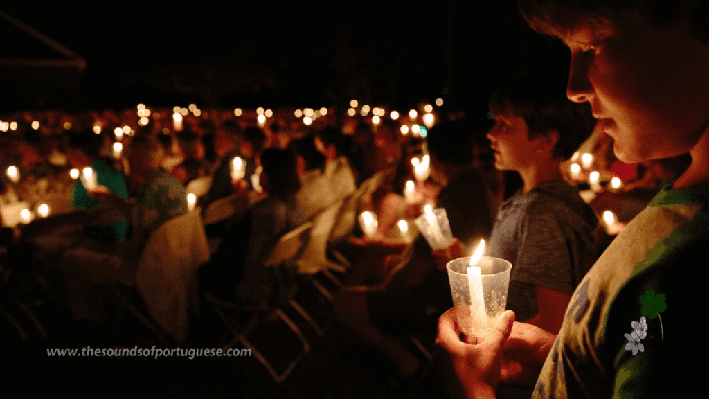 Easter Vigil Mass with candles lit in a dark church